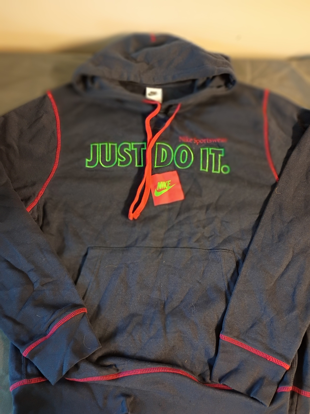 Nike Women's Navy Hoodie with Neon Green 'JUST DO IT.' and Red Accents